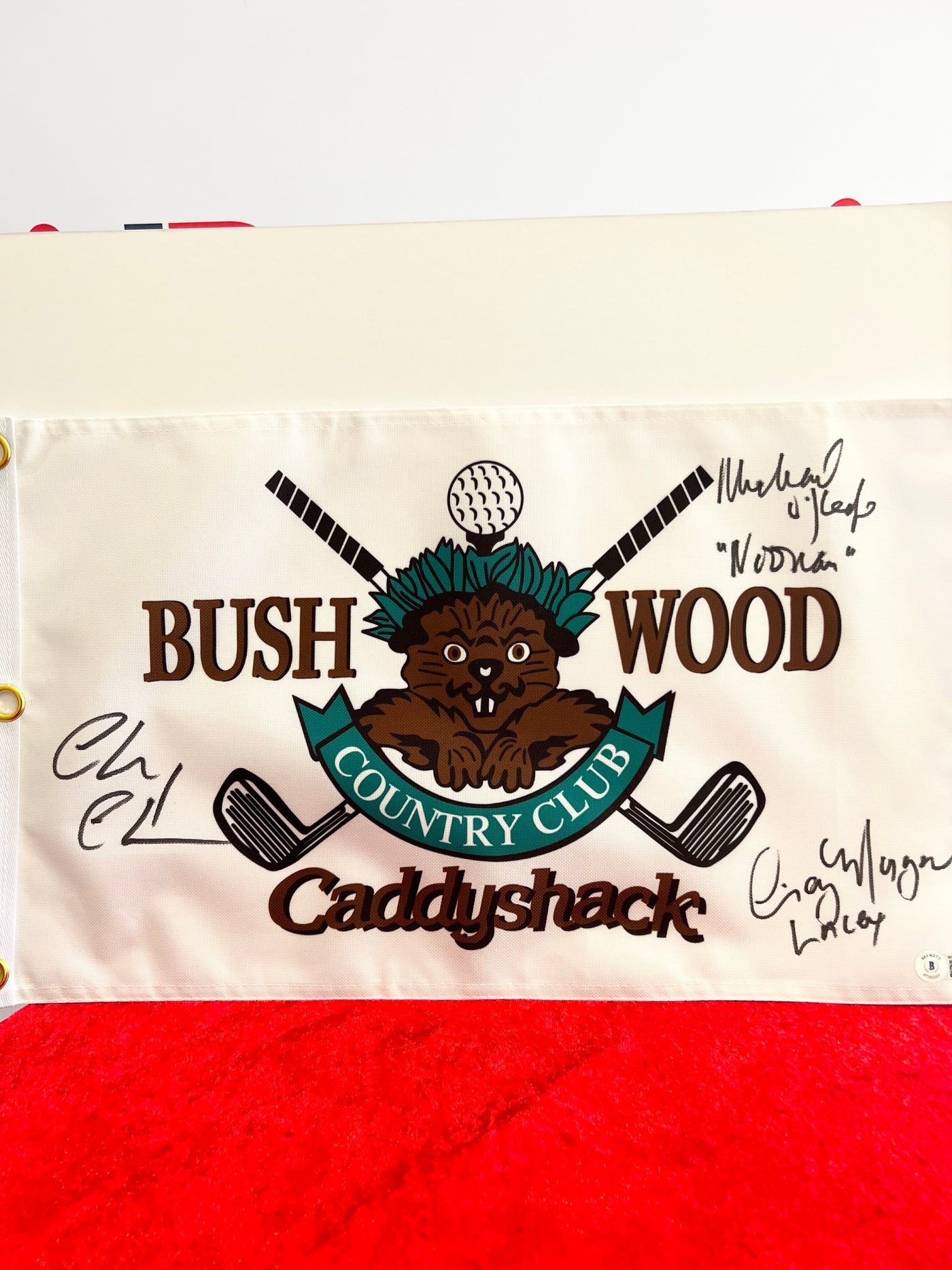 Chevy Chase Michael OKeefe Cindy Morgan Signed Caddyshack Golf Flag with inscriptions Beckett Authentication