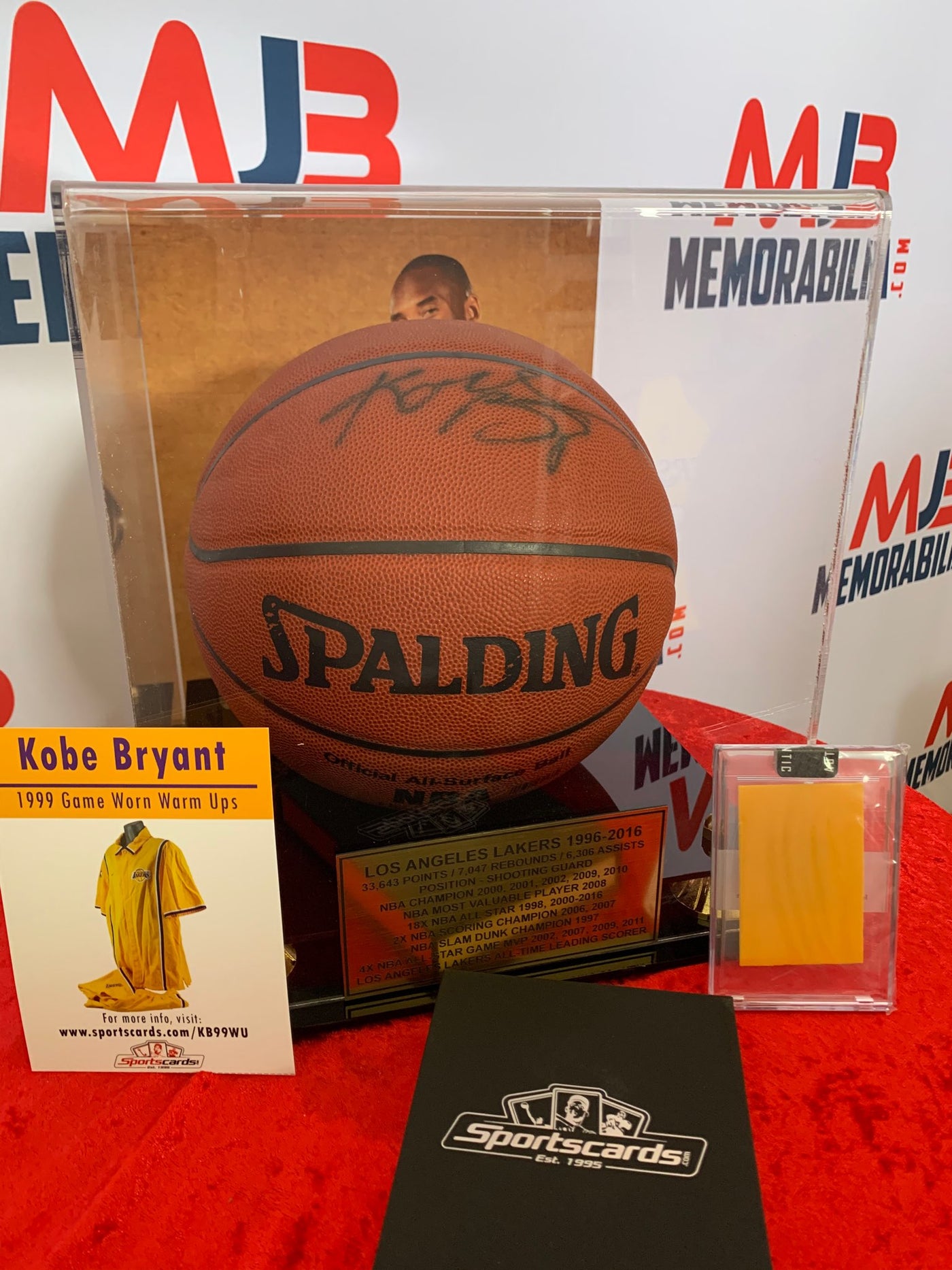 Kobe Bryant Signed NBA Basketball in Display case and 1999 Game Worn Warm ups Piece (Beckett and PSA COA)