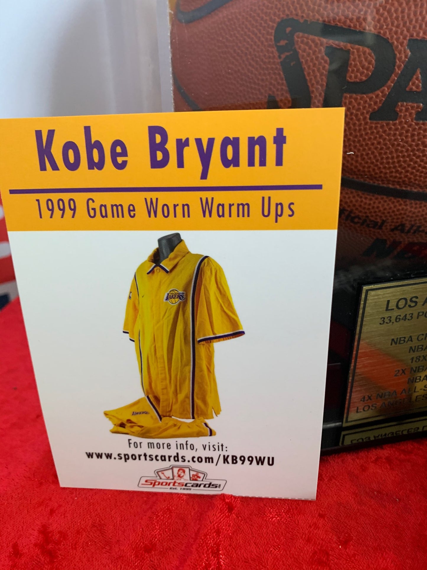 Kobe Bryant Signed NBA Basketball in Display case and 1999 Game Worn Warm ups Piece (Beckett and PSA COA)