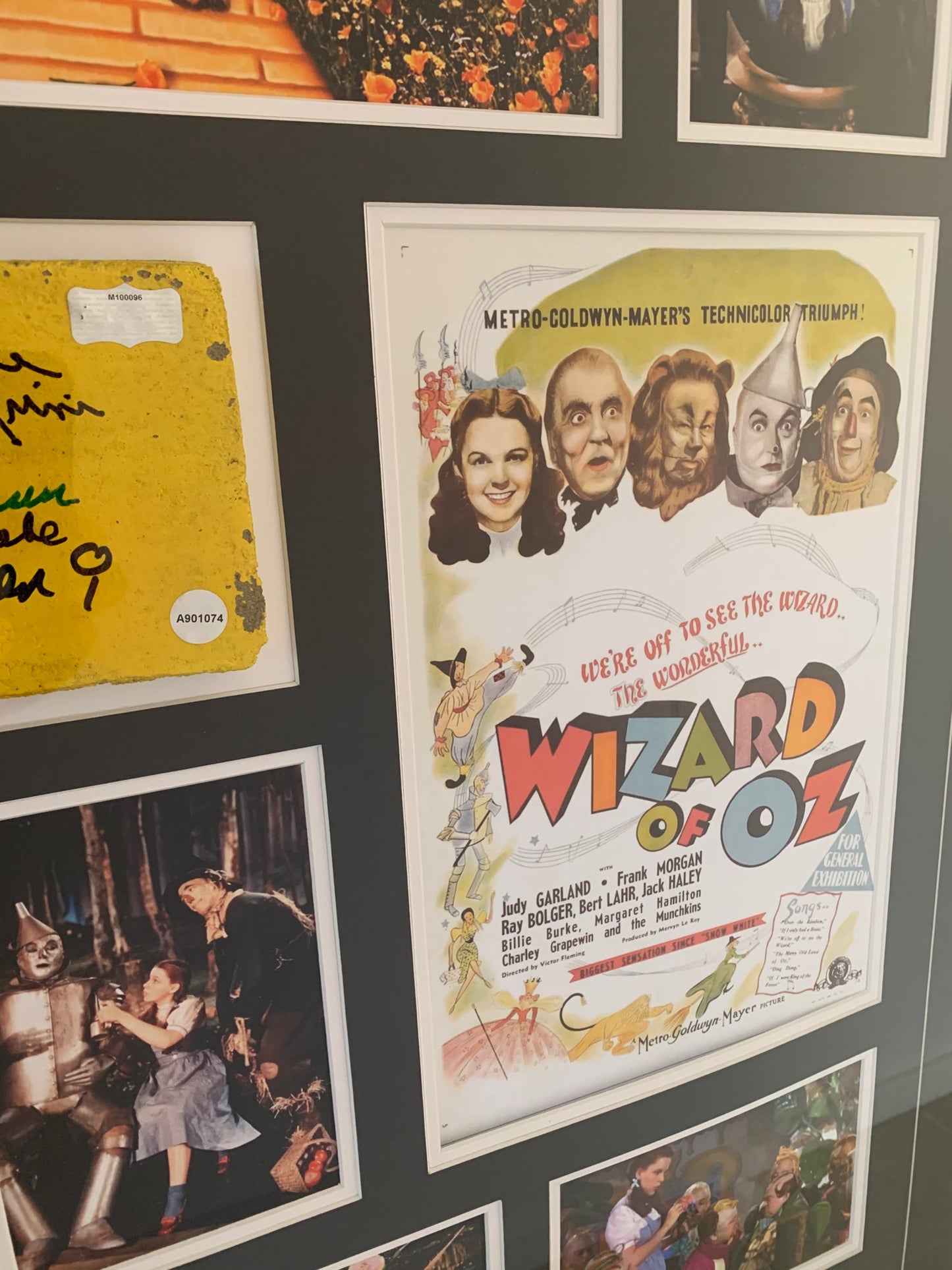 Wizard of Oz authentic signed by 7 munchkins yellow brick movie prop