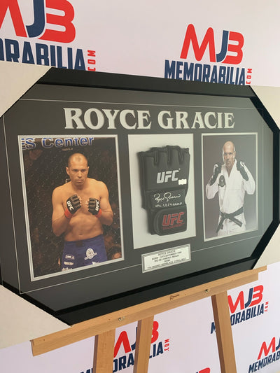 Royce Gracie Signed UFC MMA autographed fighting glove with inscriptions “1, 2 and 4 Champ” Authentication